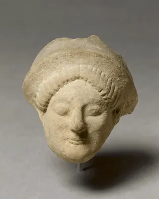 s_archaic-greek-sculpture_1